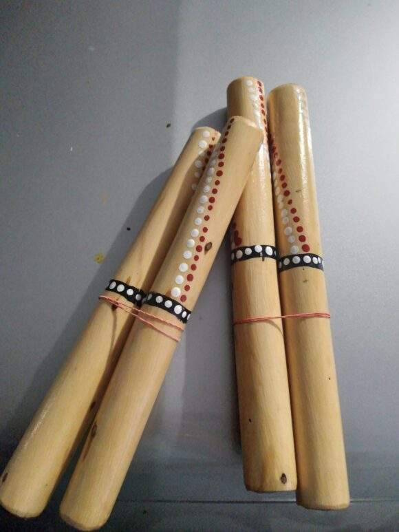 Hand made and painted clap sticks.